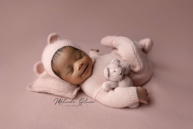baby smiling pink bear 768x512