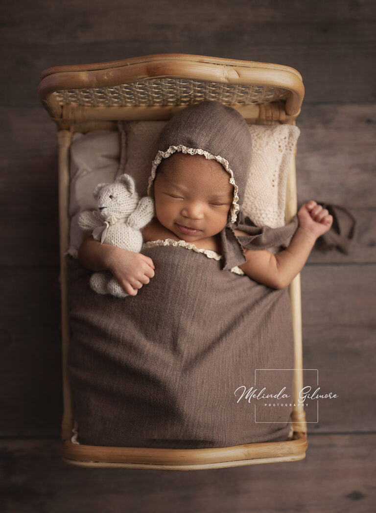 newborn baby girl bed prop bear 768x1048